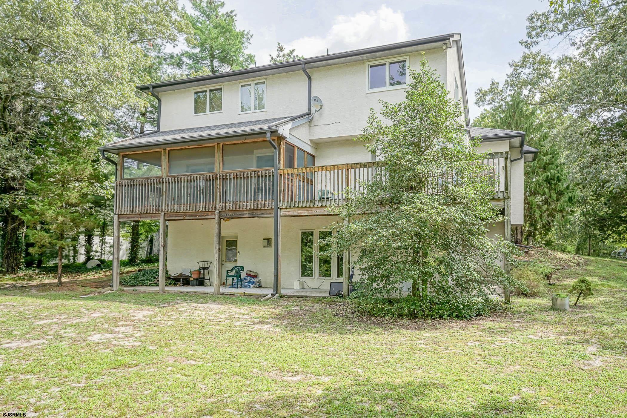 1099 Somers Point Road Egg Harbor Township, NJ 08234 - Photo 10 of 55 a front view of a house with a yard