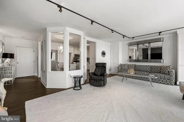 a bedroom with furniture and a fireplace