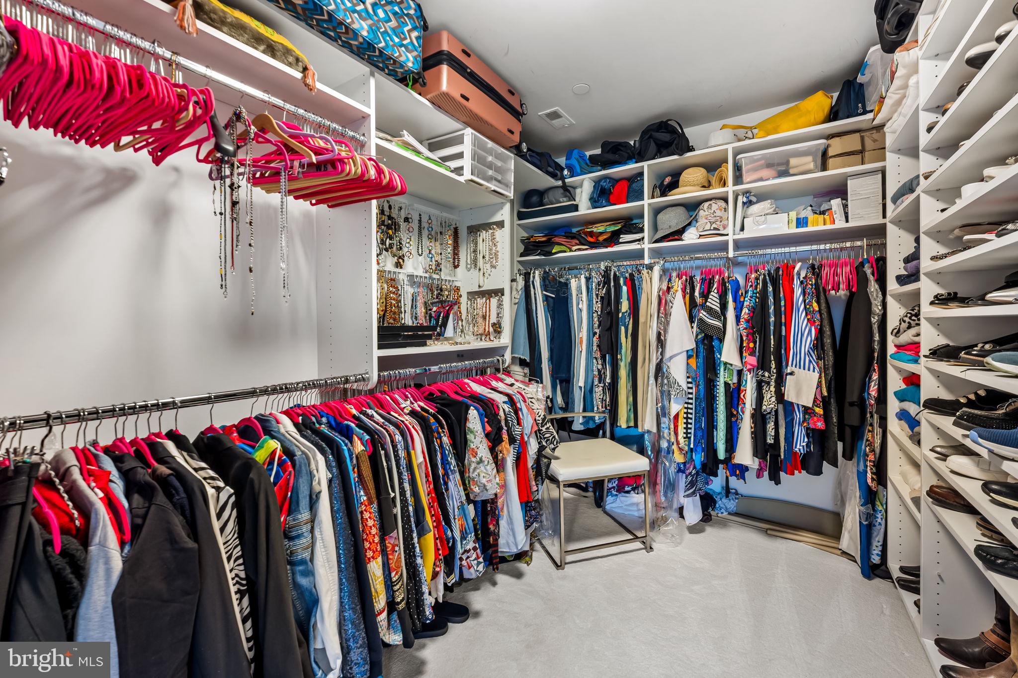 4001 Old Court Road, Unit 517 Baltimore, MD 21208 - Photo 34 of 38 a view of walk in closet with clothes