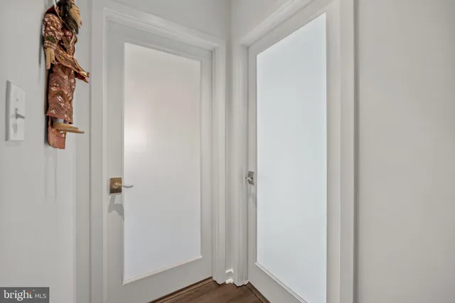 a view of a hallway with entryway