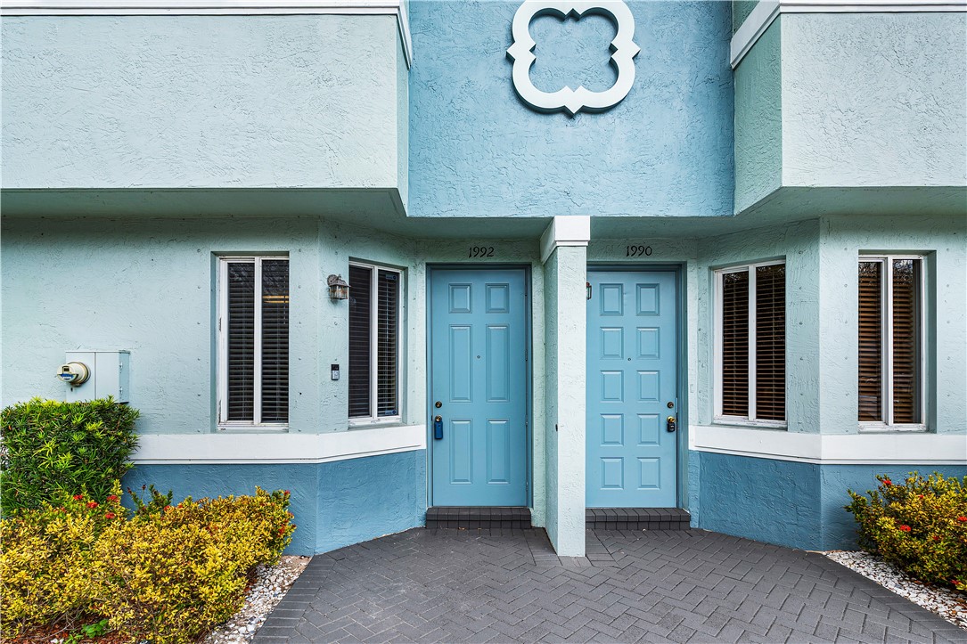 a front view of a house having yard