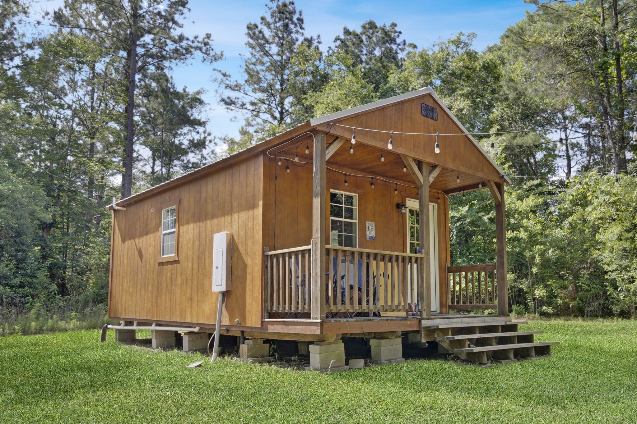 129 County Road 3160 Colmesneil, TX 75938 - Photo 16 of 40 East cabin right at the fork. Tucked into the trees, perfect for short-term rentals or a private retreat.