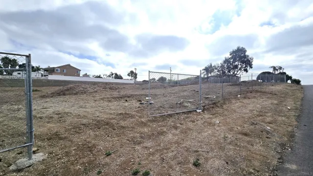 a kitchen with stainless steel appliances a sink stove and cabinets