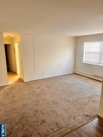 en empty room with windows