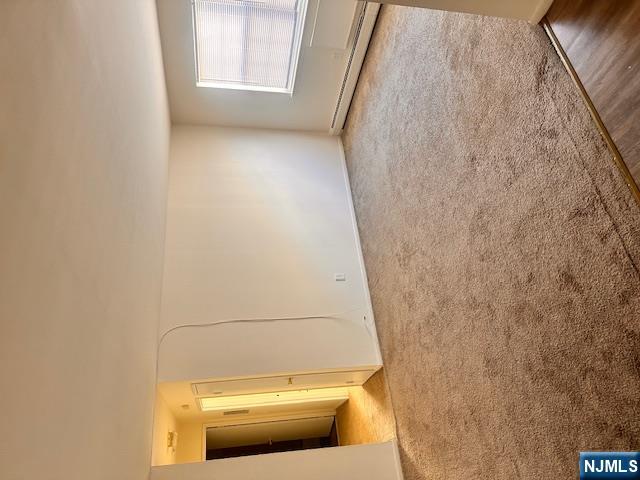 278 Main Street, Unit C3 Little Ferry, NJ 07643 - Photo 3 of 7 en empty room with windows