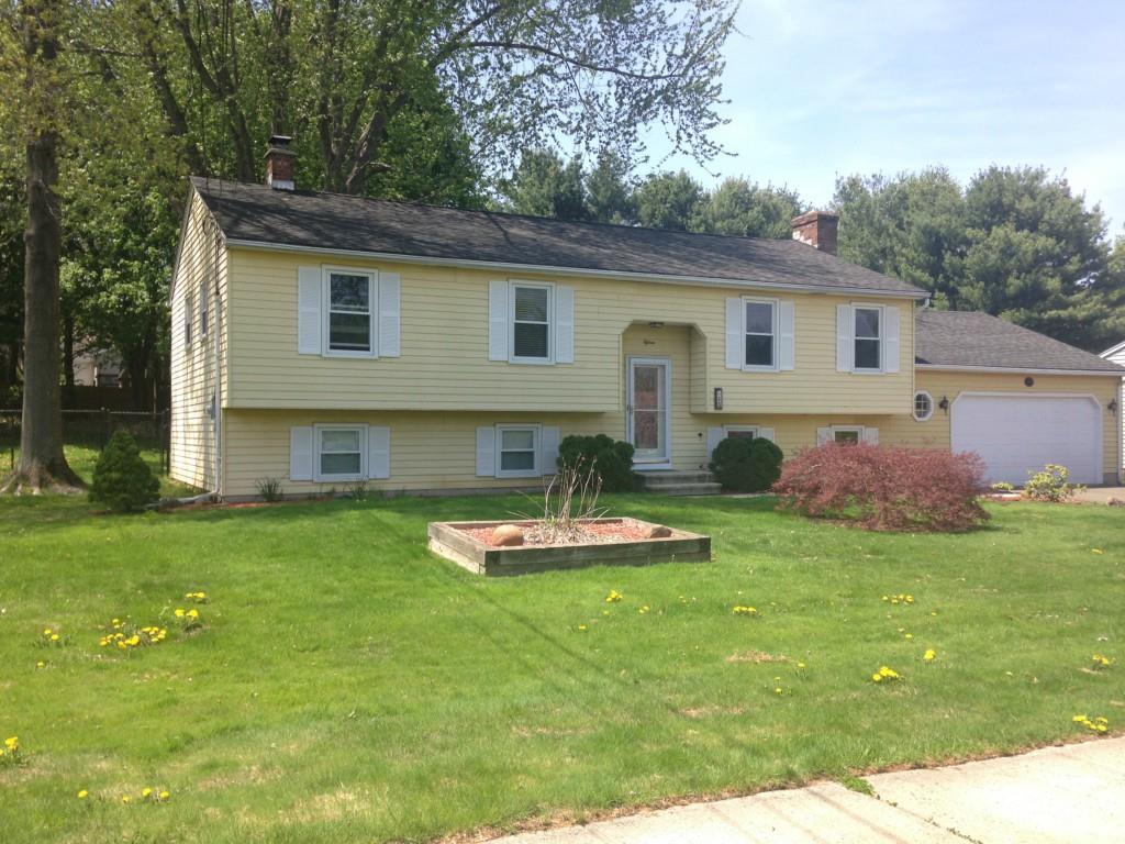 15 Nod Brook Road Wallingford, CT 06492 - Photo 1 of 1 a front view of a house with a garden