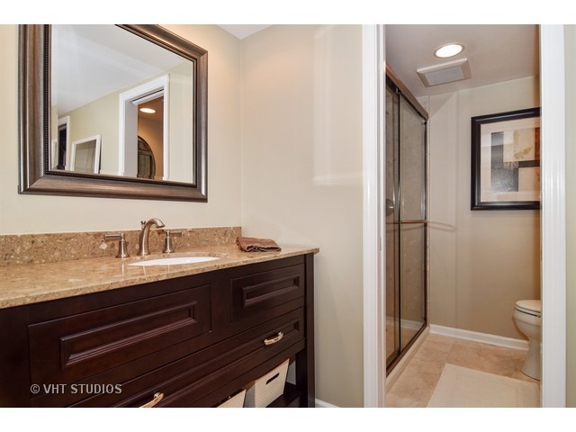 2 Old Valley Road Rolling Meadows, IL 60008 - Photo 11 of 17 a bathroom with a granite countertop sink vanity and mirror