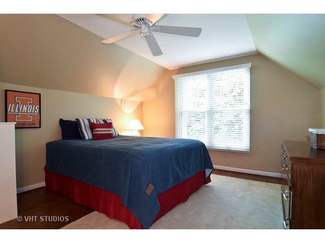 2 Old Valley Road Rolling Meadows, IL 60008 - Photo 12 of 17 a bedroom with a bed and a chandelier