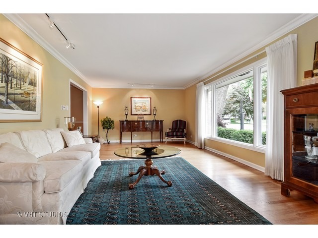 2 Old Valley Road Rolling Meadows, IL 60008 - Photo 3 of 17 a living room with furniture fireplace and a large window