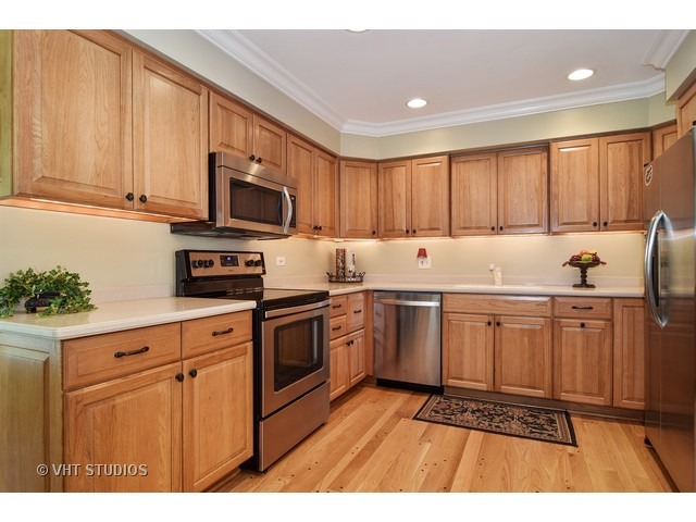 2 Old Valley Road Rolling Meadows, IL 60008 - Photo 4 of 17 a kitchen with granite countertop a sink stainless steel appliances and cabinets