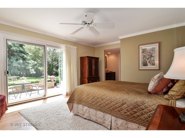 2 Old Valley Road Rolling Meadows, IL 60008 - Photo 10 of 17 a bedroom with a large bed and a large window
