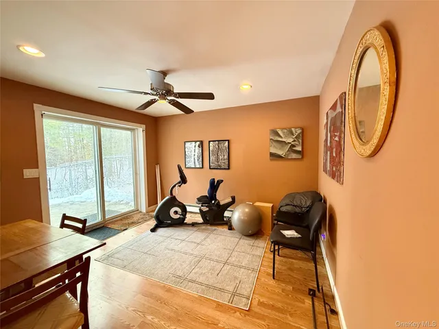 a room with furniture a window and a chandelier