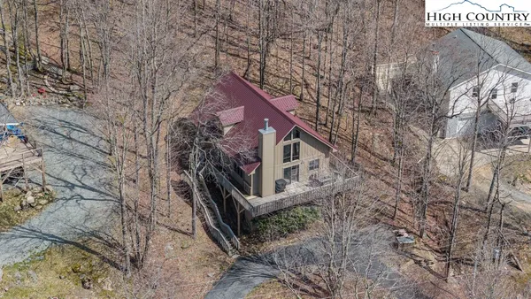 a house that has tree in front of it