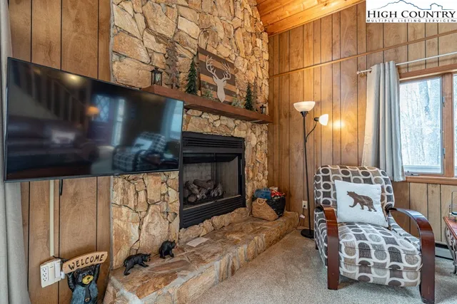 a view of an entryway with a fireplace