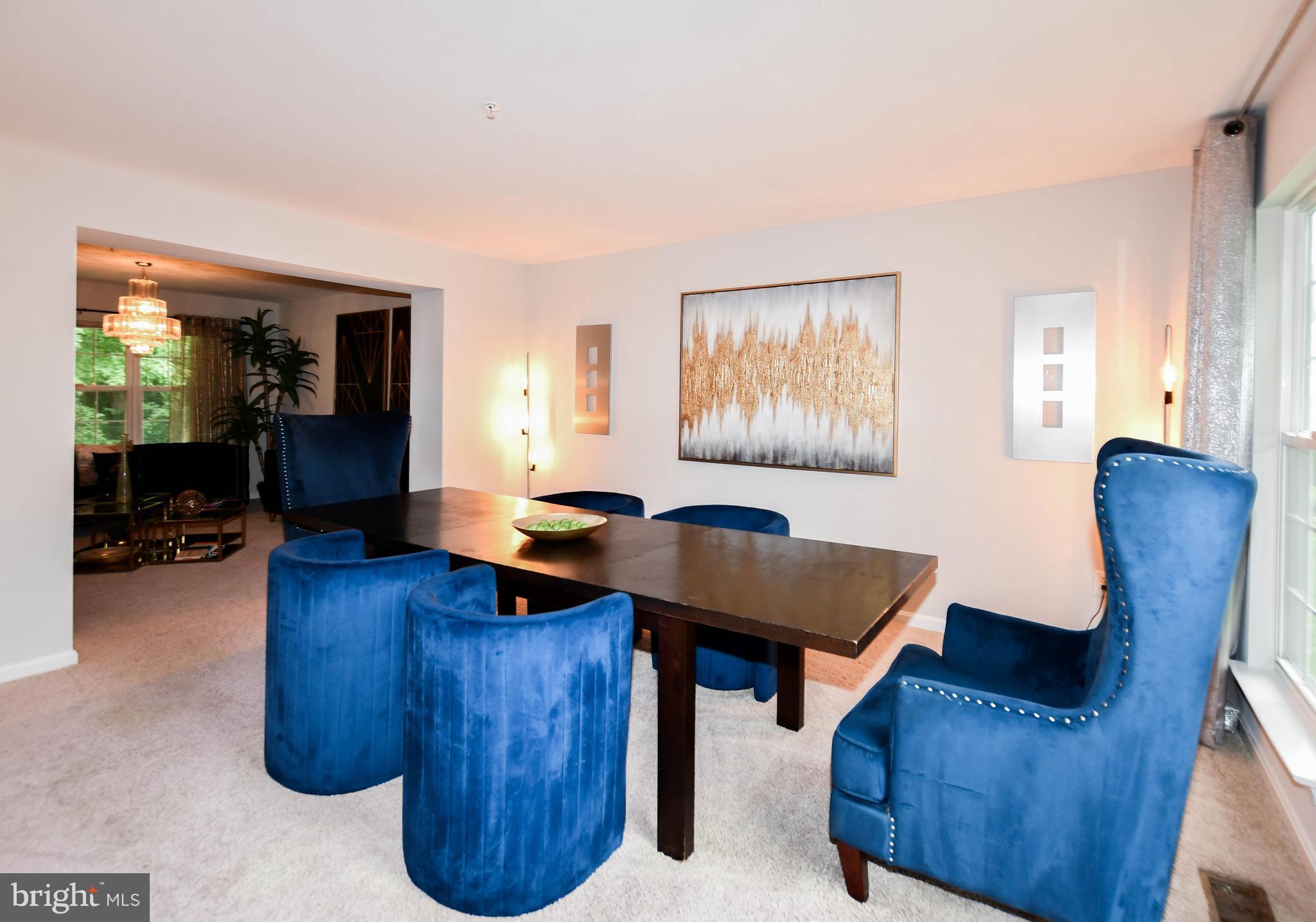 1112 Ryon Way District Heights, MD 20747 - Photo 6 of 63 a living room with furniture a flat screen tv and a window