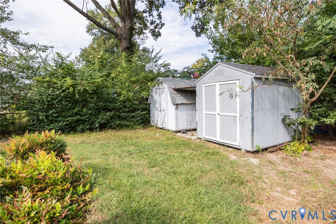 3000 Perlock Road Richmond, VA 23237 - Photo 15 of 16 View of shed with view of wooded area
