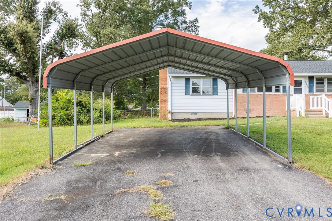 3000 Perlock Road Richmond, VA 23237 - Photo 3 of 16 View of vehicle parking featuring a detached carpo