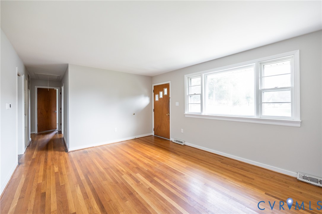 3000 Perlock Road Richmond, VA 23237 - Photo 5 of 16 Unfurnished living room featuring attic access and
