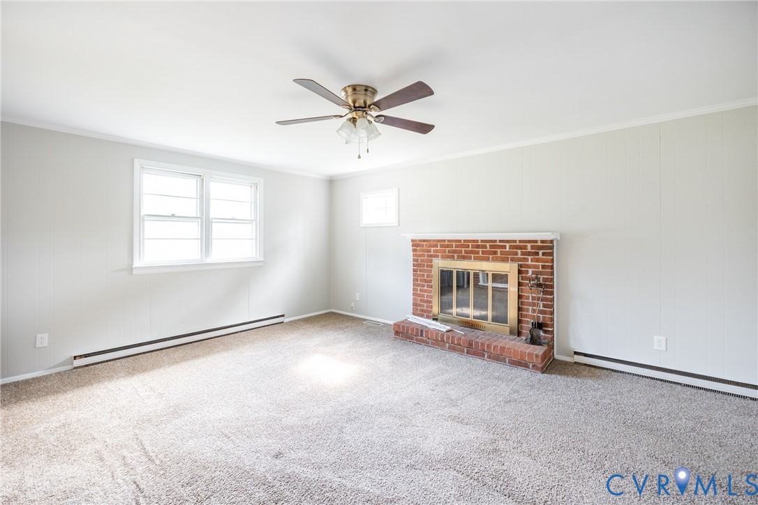 3000 Perlock Road Richmond, VA 23237 - Photo 6 of 16 Unfurnished living room with ornamental molding, a