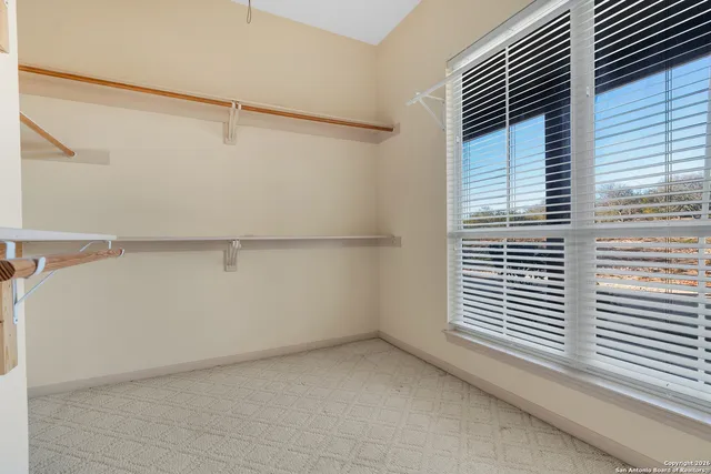 a view of a room with racks on the wall