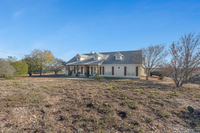 a view of house with outdoor space