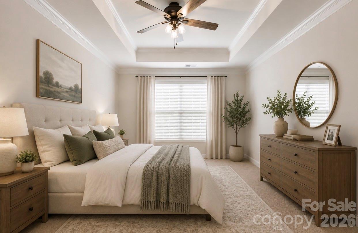 4229 Millstream Road Denver, NC 28037 - Photo 15 of 34 a bedroom with a large bed and a chandelier