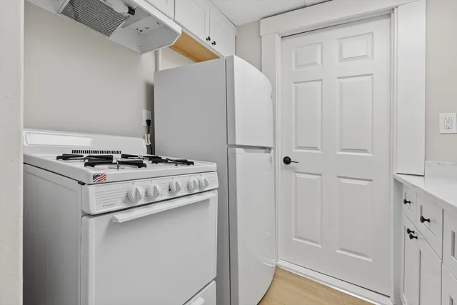 a utility room with washer and dryer