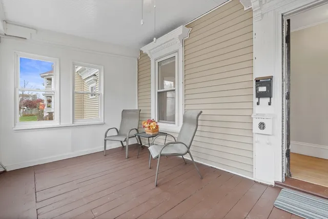 a work room with furniture and windows