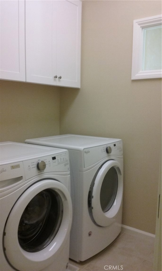 182 Working Ranch Irvine, CA 92602 - Photo 15 of 21 a utility room with dryer and washer