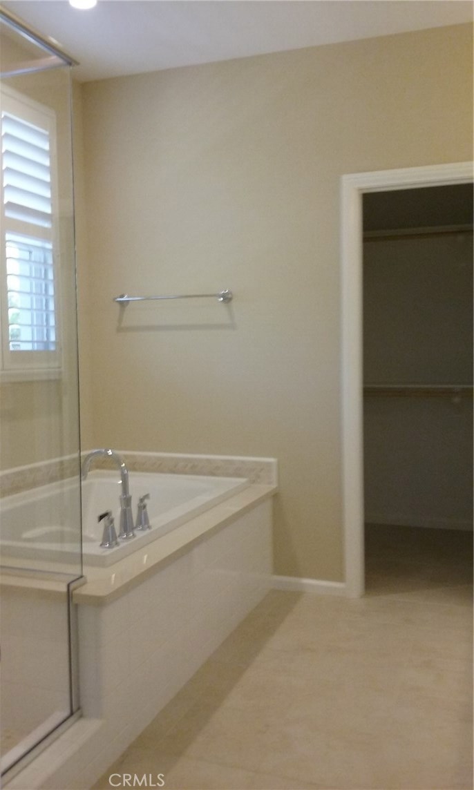 182 Working Ranch Irvine, CA 92602 - Photo 17 of 21 a bathroom with a sink and a mirror