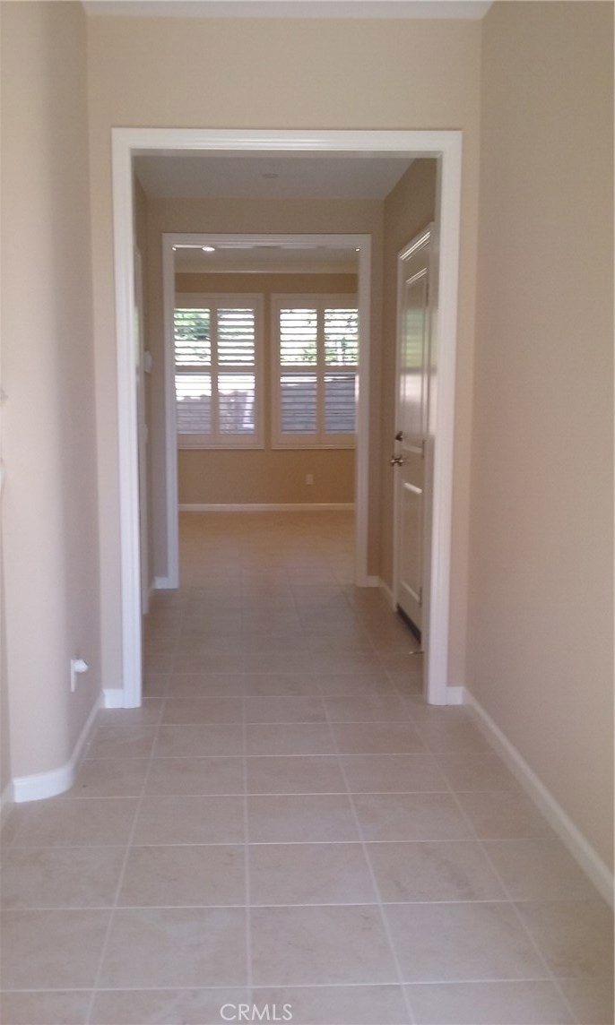 182 Working Ranch Irvine, CA 92602 - Photo 5 of 21 a view of an empty room with a fireplace