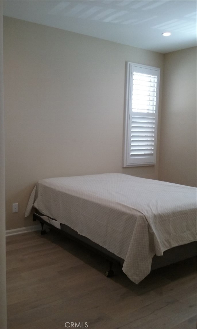 182 Working Ranch Irvine, CA 92602 - Photo 10 of 21 a bed sitting in a bedroom next to a window