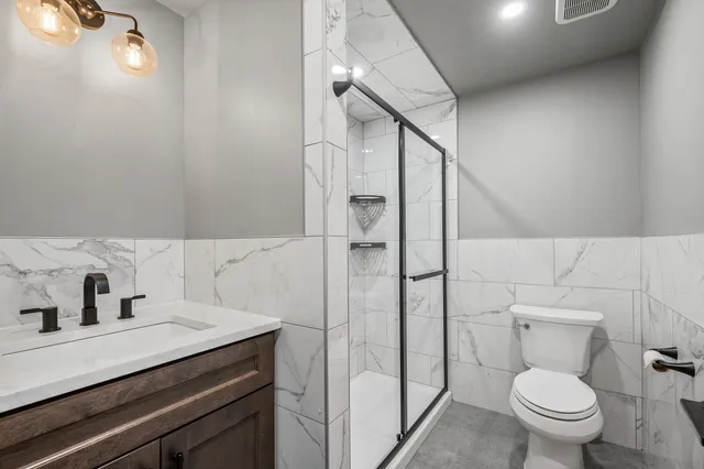 a view of an empty room with a fireplace