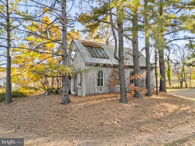a view of a house with swimming pool
