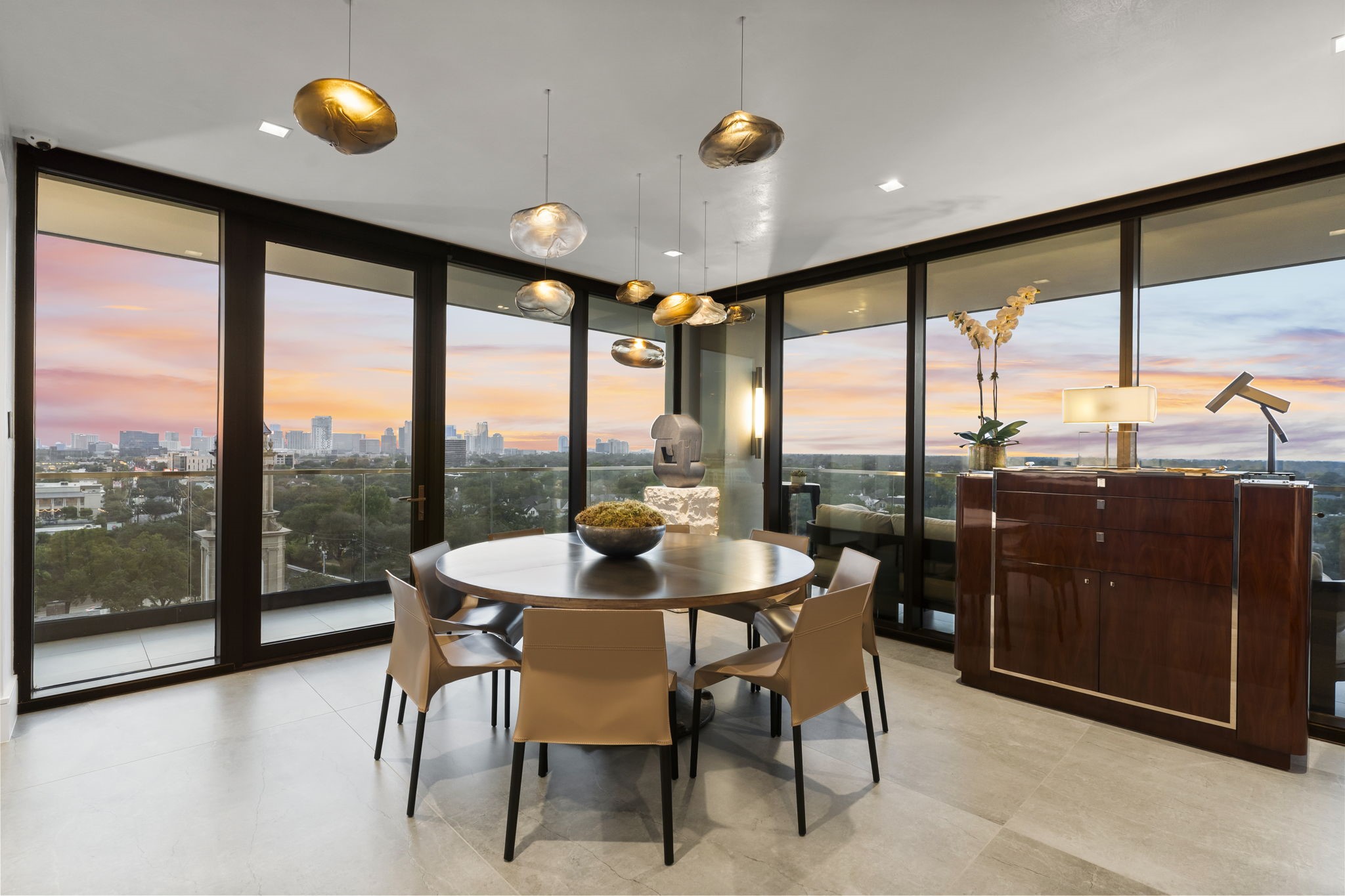 3433 Westheimer Road, Unit 1005 Houston, TX 77027 - Photo 11 of 47 a view of a dining room with furniture window and outside view
