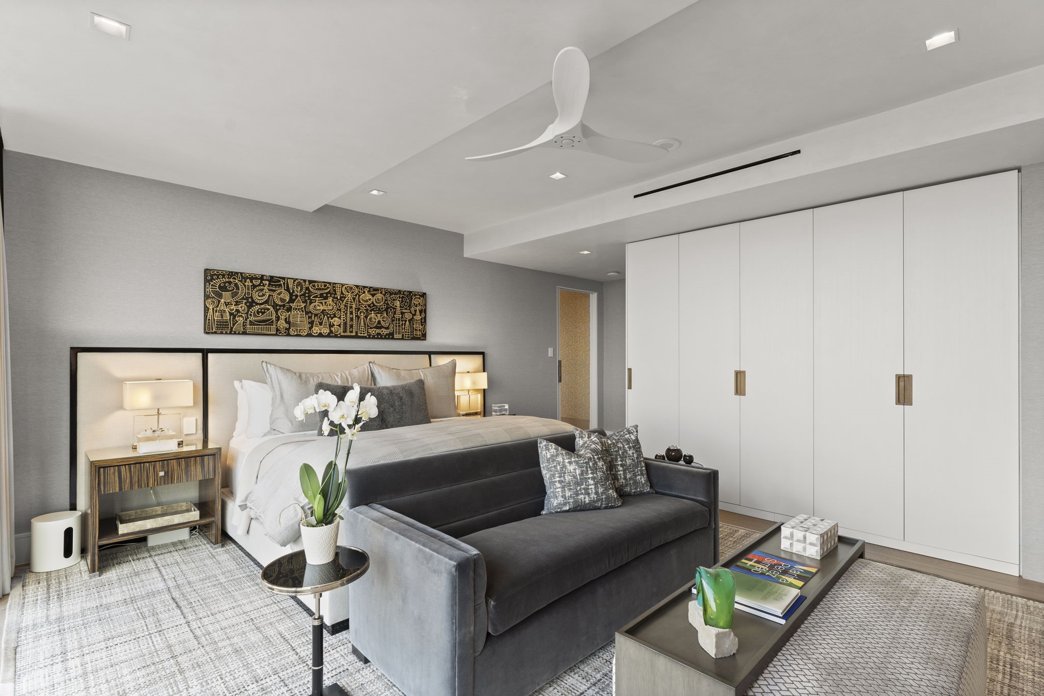 3433 Westheimer Road, Unit 1005 Houston, TX 77027 - Photo 24 of 47 An elegantly scaled retreat with custom built-in cabinetry and a sitting area. Pocket doors glide on 12? Revere-nickel pulls for a satisfyingly weighty, bespoke feel. Hand-troweled Segreto plaster ceiling lends a calm, luminous finish.