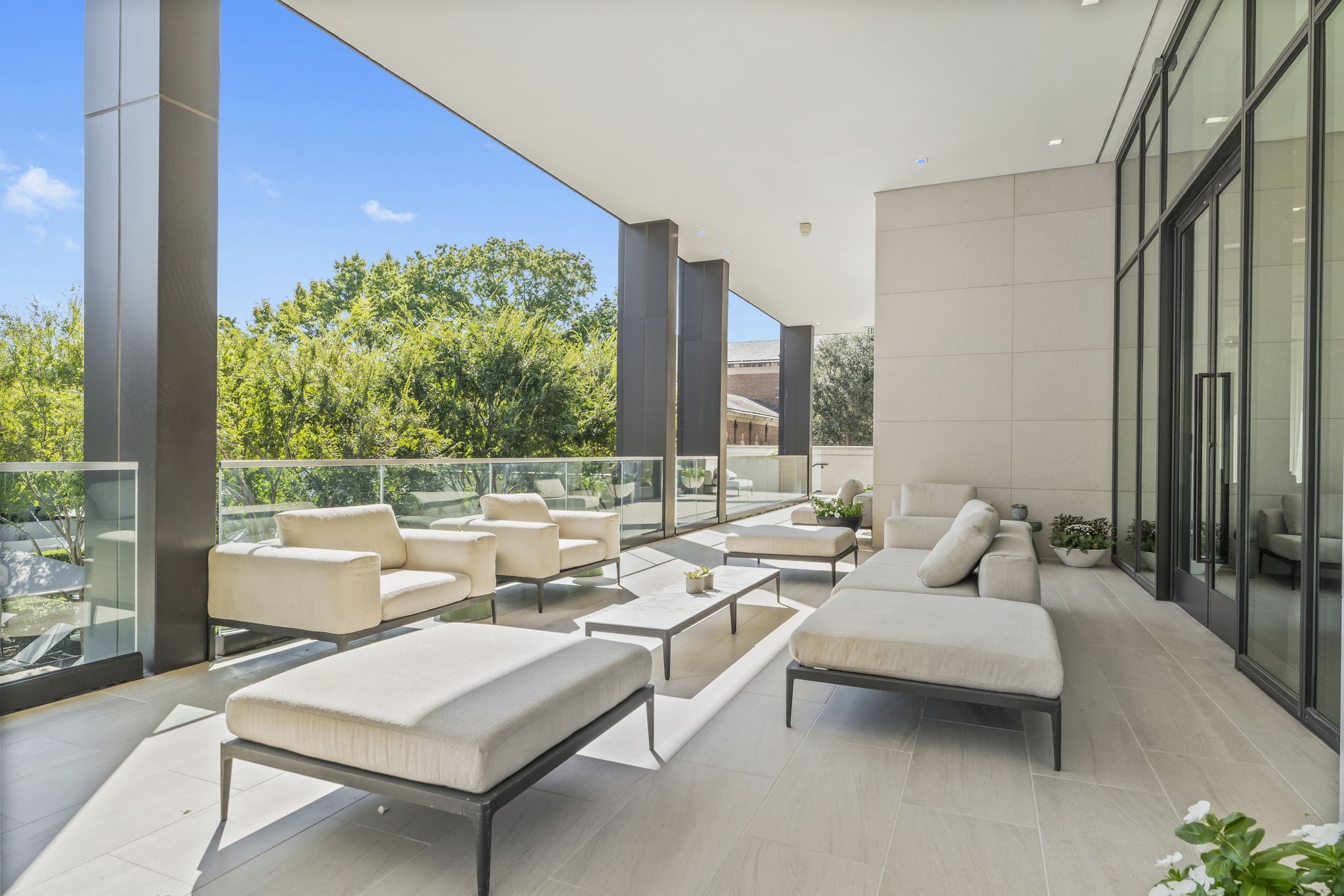 3433 Westheimer Road, Unit 1005 Houston, TX 77027 - Photo 46 of 47 a living room with furniture and a large window