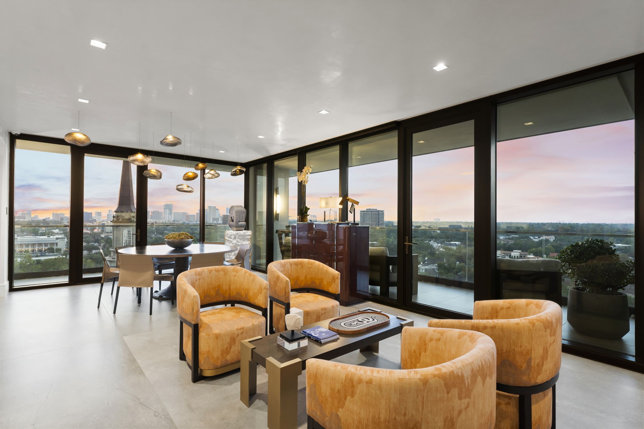 3433 Westheimer Road, Unit 1005 Houston, TX 77027 - Photo 10 of 47 a very nice looking living room with furniture and floor to ceiling windows