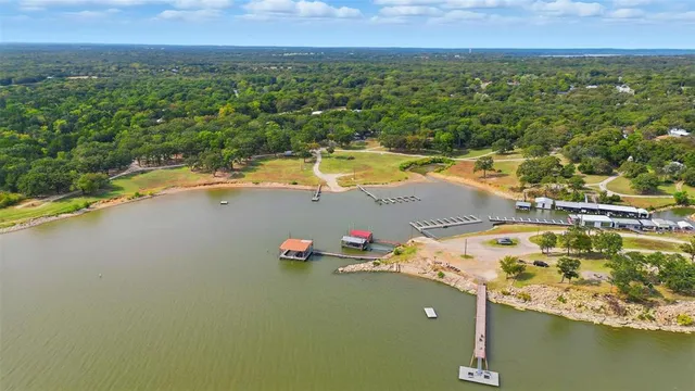 a view of a lake with a yard
