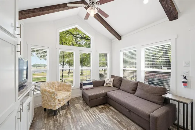 a kitchen with stainless steel appliances granite countertop a stove and cabinets