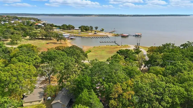 an aerial view of a house with a swimming pool