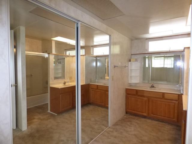 1890 Wards Creek Road Rogue River, OR 97537 - Photo 17 of 26 Master bathroom. Behind these mirror do