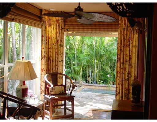 645 North Victoria Park Road Fort Lauderdale, FL 33304 - Photo 11 of 25 a view of a porch with furniture and backyard