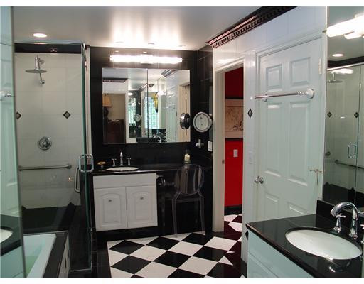 645 North Victoria Park Road Fort Lauderdale, FL 33304 - Photo 20 of 25 a bathroom with a sink a toilet and shower