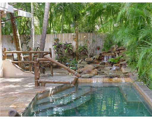 645 North Victoria Park Road Fort Lauderdale, FL 33304 - Photo 4 of 25 a view of backyard with swimming pool and outdoor seating
