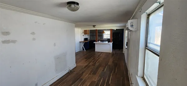 a view of entryway with kitchen