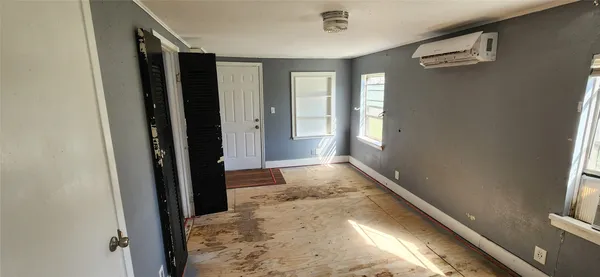 a view of entryway with wooden floor