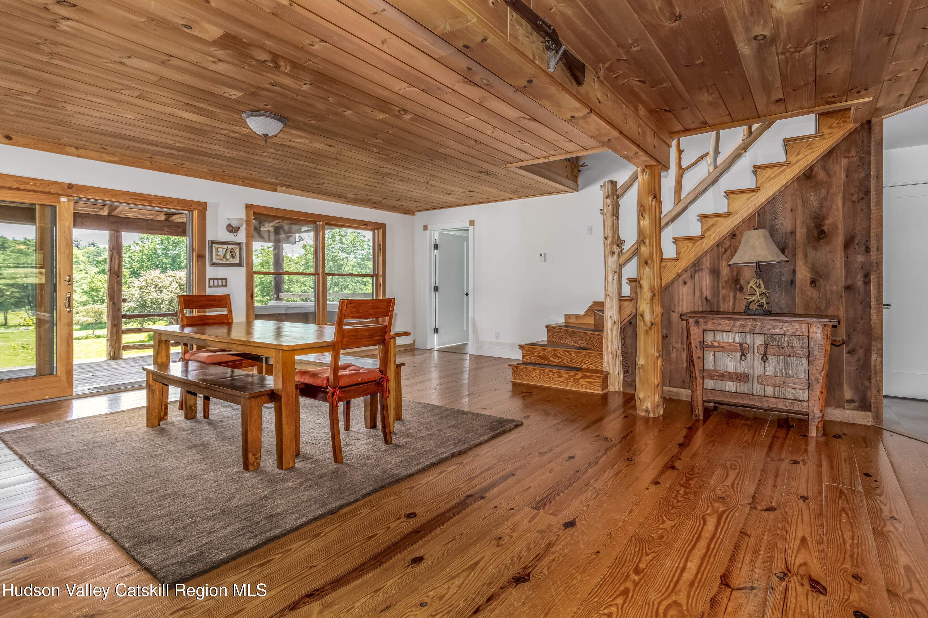 688 Bruce Porn Road Gilboa, NY 12167 - Photo 6 of 104 a dining room with furniture and wooden floor