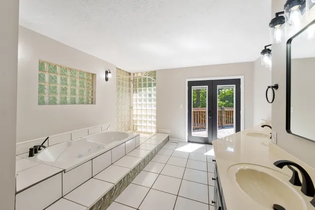 a bathroom with a sink and a bathtub