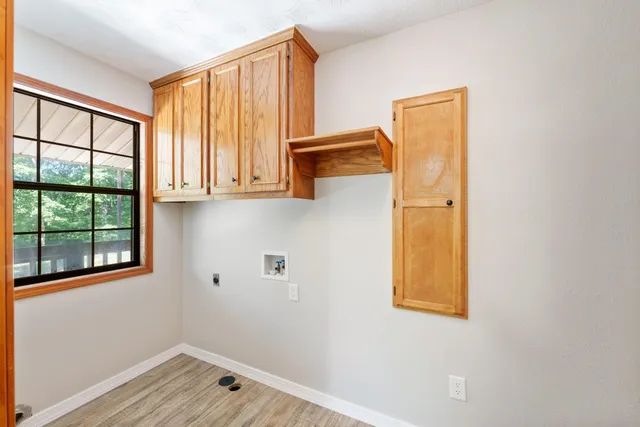 a view of walk in closet with window